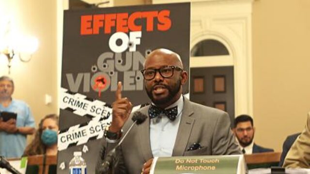 Rep. Mike A. Gipson speaking at a podium