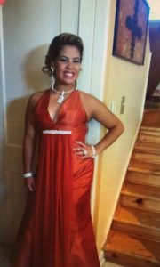 Alex smiling in formal wear for prom