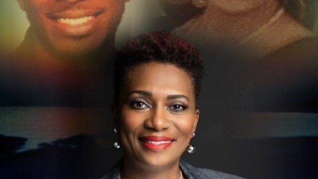 Crystal Turner with images of her two children who were murdered, Donell and Jenea